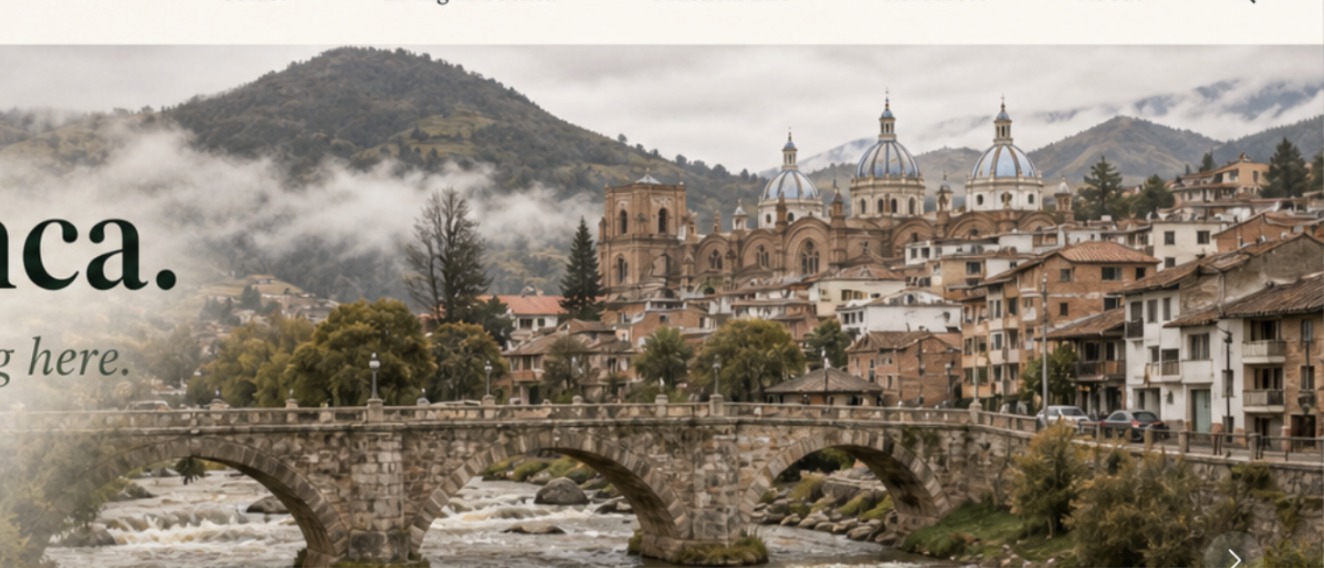 Stone bridge over the Tomebamba, Cuenca rooftops, and the cathedral’s blue domes